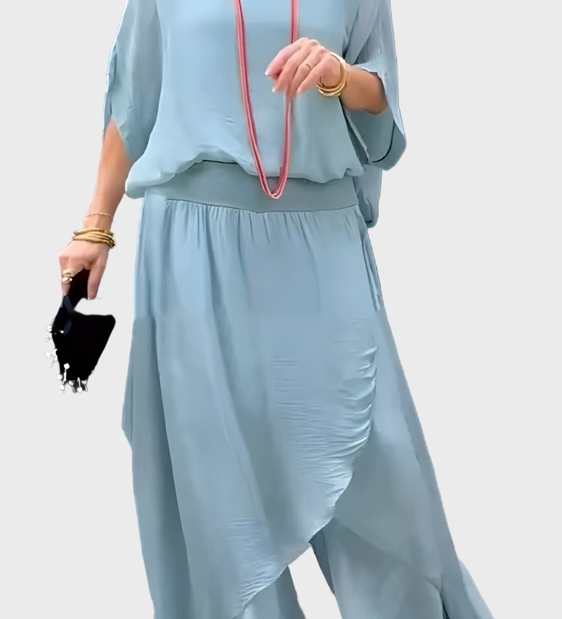 Plačios viršutinės dalies ir suplėšytos kelnės – dviejų dalių sijonas iš šifono