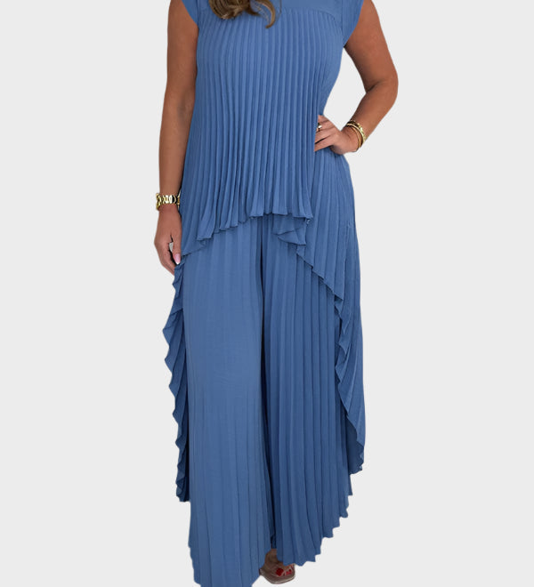 Rinkinyje su Faltuotu Viršumi su Trumpomis Rankovėmis ir Nereguliariu Midi Ilgiu, Kelnės su Platomis Apačiomis ir Elastinga Juosmeniu